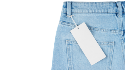 Denim blue jeans pants isolated on white, transparent background, top view. Back side of jeans with pocket and blank label tag with copy space, mockup, template.