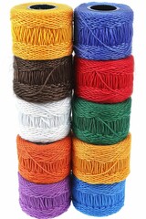 Colorful cotton threads on spools for sewing and embroidery, ideal for crafting projects