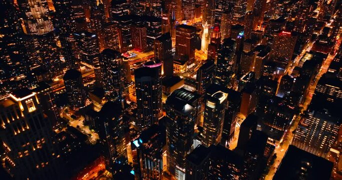 Fantastic illumination in the modern city at night. Rising above the downtown of Chicago, Illinois, US.