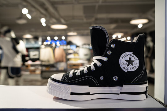 BANGKOK, THAILAND - OCTOBER 27, 2023: Converse snicker on display at Foot Locker store in Siam Center in Bangkok. Foot Locker is an American multinational sportswear and footwear retailer.