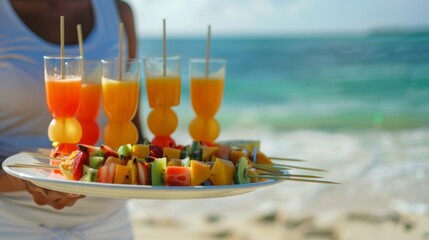 A beach attendant expertly balances a tray of tropical fruit kabobs and sparkling fruit juices as they make their way through the sandy shore.