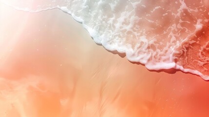 Fototapeta premium A wave crashing on a sandy beach, seen from above. The water is a vibrant turquoise and the sand is a warm beige. The sun is shining brightly, casting a warm glow on the scene.