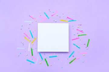Blank card with sprinkles and confetti on lilac background