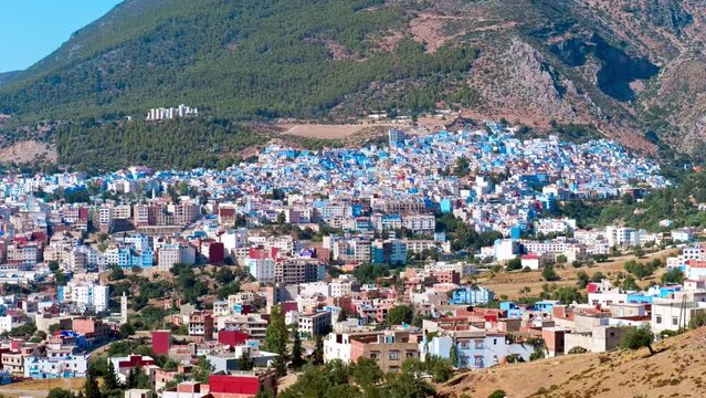 Chefchaouen, Morocco panorama of the famous Blue Pearl of Morocco or Blue City. Noted for its buildings in shades of blue, UNESCO heritage. Gimbal cinematic