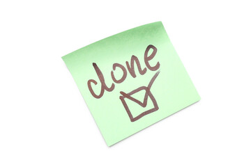 Sticky note with word DONE and check mark on white background