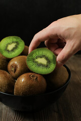 Kiwi fruit on dark background. Green Healthy organic fruit concept. 