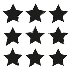 Obraz premium Grunge star icons vector. Black rough edges. Abstract brush stroke shapes. Artistic design elements.