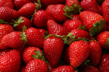 Texture of sweet fresh strawberries as background, closeup