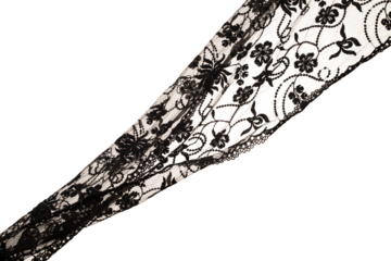 Black lace fabric flying in curve shape, Piece of textile black lace fabric throw fall in air. White background isolated, dark shading environment