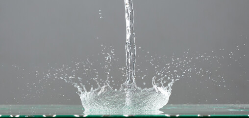 Crown Water splash on object to create shape form fluttering in droplet and wave. Crown water to...