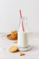 Bottle of fresh milk with oatmeal cookies