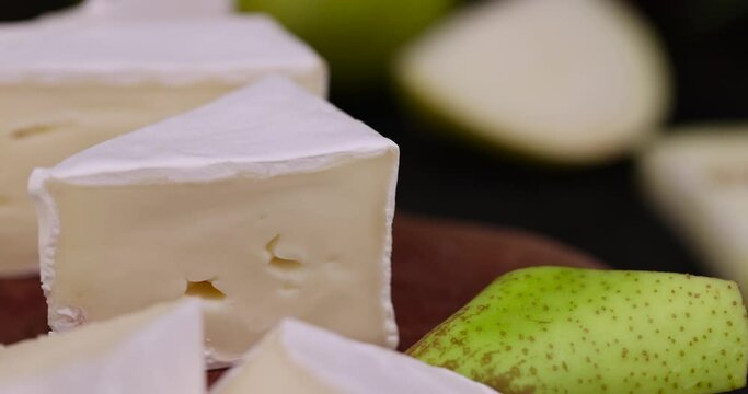 cheese with white mold cut into chunks , preparation of cheese with mold for use in cooking