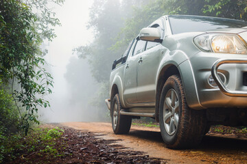 Off-road travel on mountain road after the rain.