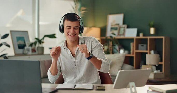 Man, laptop and dance in house with headphones for radio, sound and rap music streaming while studying. Student, happy and audio in home with subscription service for hip hop or rapper diss track