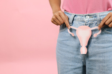 Woman Hands Holding Papercut Uterus, Female Reproductive System , Woman Health, PCOS And Cervix...