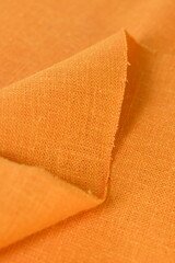 Obraz premium orange hemp viscose natural fabric cloth color, sackcloth rough texture of textile fashion abstract background