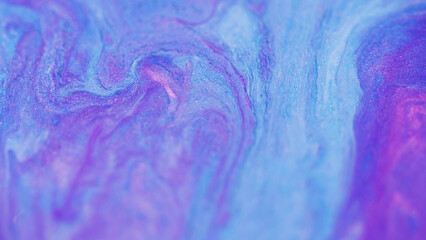 Shiny ink spill. Acrylic liquid flow. Defocused purple pink blue color sparkling sand glitter...