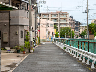 Fototapeta premium 水路が通る大阪の市街地