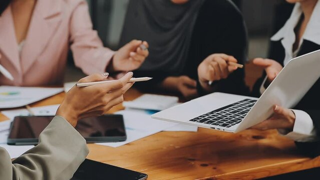 Team of business people are meeting to analyze data for marketing plan,Market research reports and income statistics, Financial and Accounting concept.