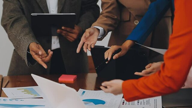 Team of business people are meeting to analyze data for marketing plan,Market research reports and income statistics, Financial and Accounting concept.