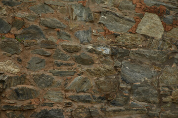 Stone wall closeup. Stone wall as a background, texture.
