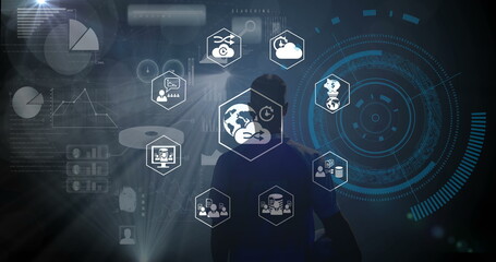 Young Caucasian man interacting with futuristic digital interface