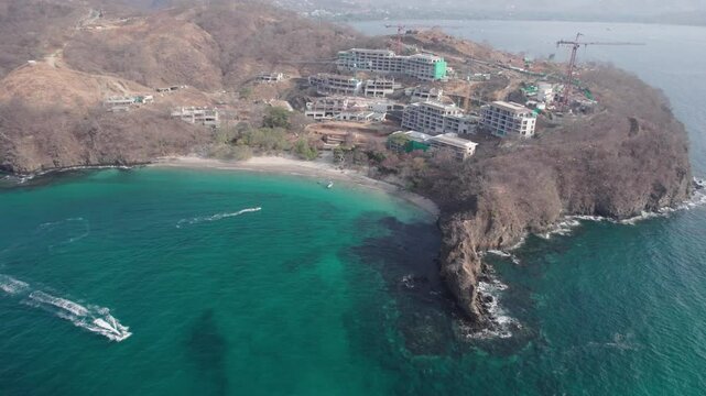 Aerial shoot of exotic turquoise Playa Penca beach in Guanacaste, Costa Rica
