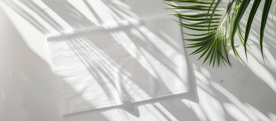 Top view of a white beach towel mockup on a white background