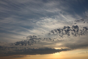 Serene Sunset Sky with Dramatic Clouds. Experience the peaceful beauty of nature at dusk