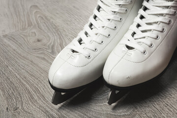 White old skates close-up. Figure skating and hobby sports. 
