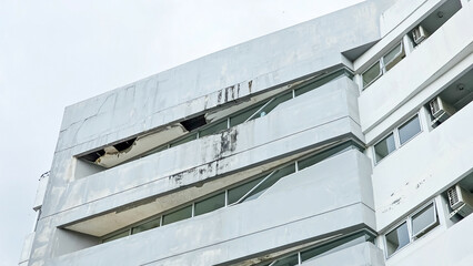 Old building facade, run down house exterior, Ceilings damaged by moisture. Detail of old...