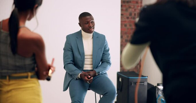 Black man, photographer and picture with model in fashion for production, film or content at studio. Young African or happy male person posing with producers for camera shoot in stylish clothing