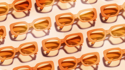 Pattern of Trendy sunglasses with Yellow orange  Frame on peach color,  beach vibes, summertime mood, sunlight shadow, color gradient. Summer vacation concept Minimal banner of eyeglasses