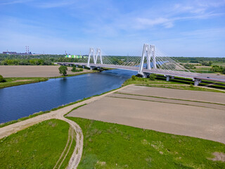 Aerial view landscape, view of fields, meadows, river and bridge. Photo from a drone.