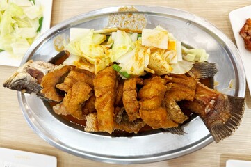Fried Fish in Thai Sour Soup with Mixed vegetable