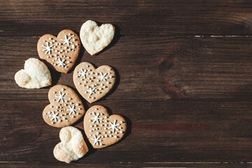 Homemade cookies in the shape of hearts with snowflakes