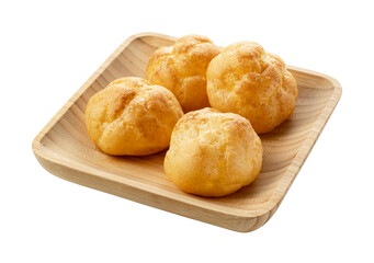 Cream puffs on a plate placed on a white background.