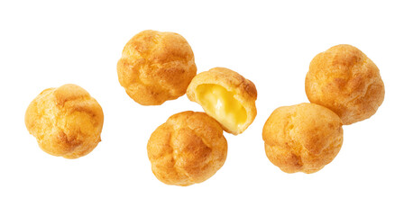 Multiple cream puffs placed on a white background. View from directly above.
