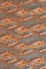 Close up detail of a metal manhole cover