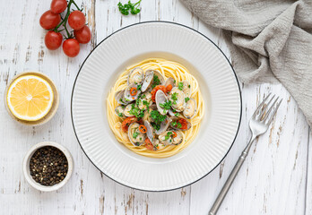 Pasta Vongole with white wine, garlic and parsley, top view