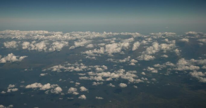 Georgia. Ushba mount. View From Airplane Window On Snow-capped Peaks Of Mount Elbrus And Main Caucasian Range. Travel And Tourism Around World. Mountains range. Caucasus