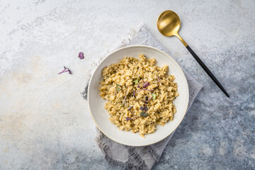 Roasted organic cauliflower rice with herbs - paleo and ketogenic diet concept