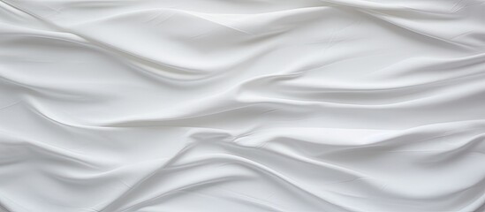 Naklejka premium A white paper background with creases for a textured effect perfect for copy space images