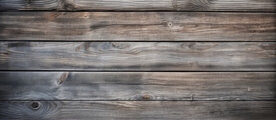 Fototapeta premium A weathered wooden surface with a rustic texture perfect for creating a captivating background in various creative projects The copy space image adds versatility and allows for creative placement of