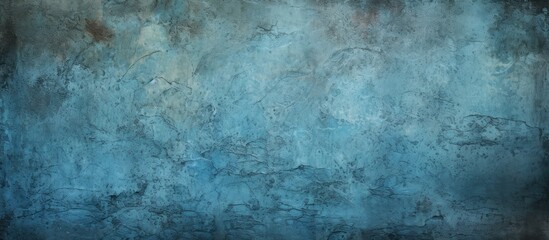 Fototapeta premium An abstract grunge background featuring a blue decorative plaster texture and a vignette effect It provides ample copy space for design purposes