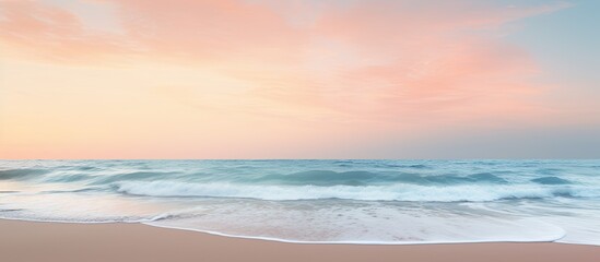 A serene summer beach at sunset featuring soft pastel tones and a copy space image