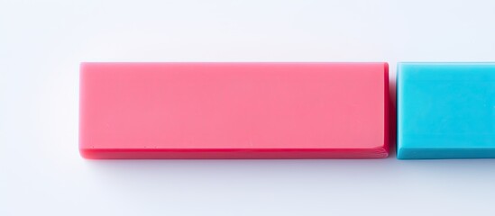 Fototapeta premium A vibrantly colored eraser captured in a close up shot with empty space around it on a white backdrop. copy space available