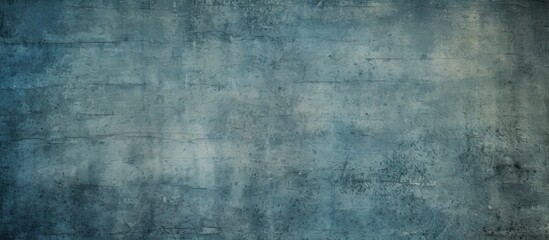 A textured sample of rough marine blue recycled paper with a vignette effect and grungy texture is depicted in the copy space image