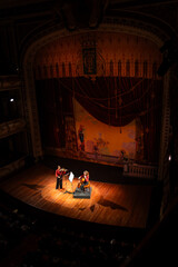 Female cello violin duo. Scene during the concert in the theater. © Alfonso Soler