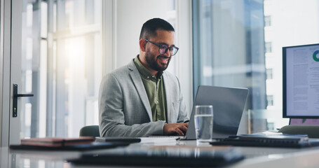 Businessman, typing and happy with laptop in office for project management feedback and positive...